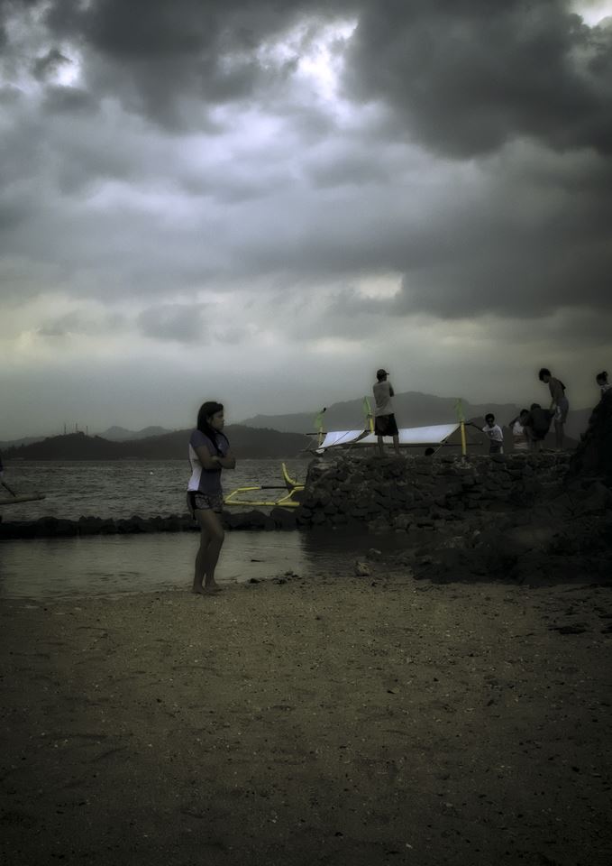 Tropical swimmers feel the chill as a storm approaches