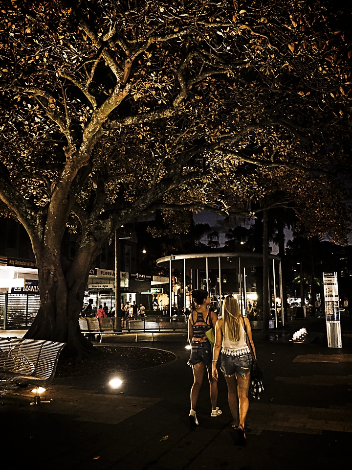 Girls walking along Manly Corso at night